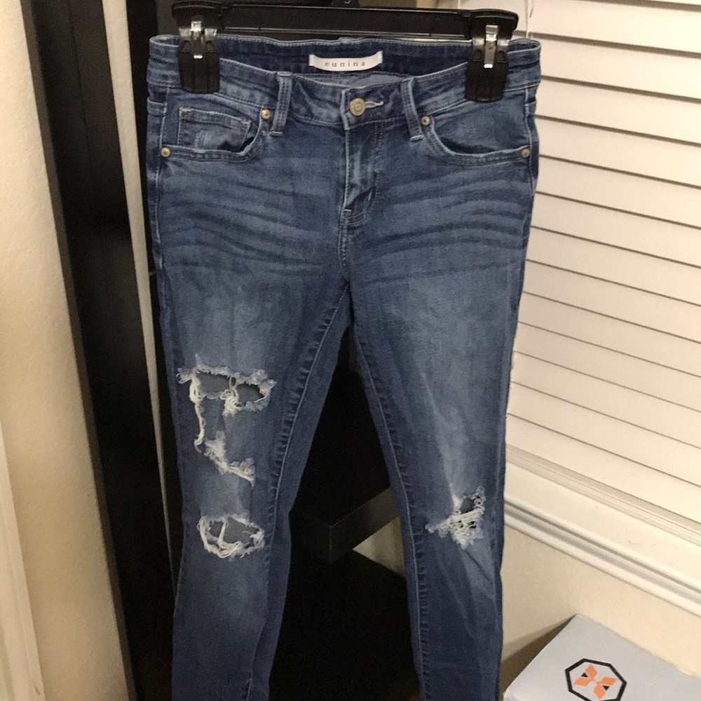 Blue ripped/faded jeans